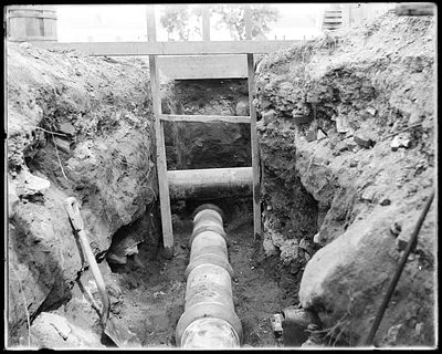 Sewer construction, sewer going under town water pipe