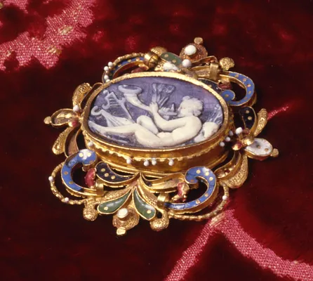 Dress Ornament with Young Faun Blowing his Trumpet