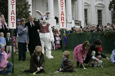 President George W. Bush, Joined by Mrs. Laura Bush, Blows a Whistle to Officially Start the Festivities for the 2008 White House Easter Egg Roll