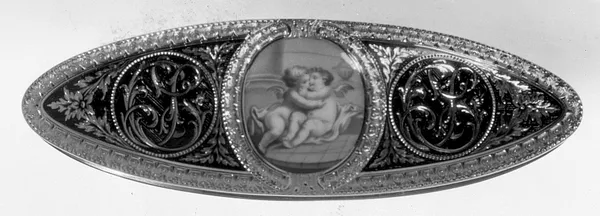 Shuttle with Monogram and Putti