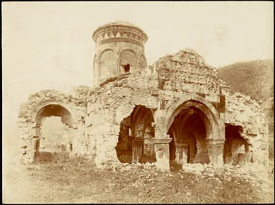 Ruins of an old Romanesque-style building (possibly a church or mosque)