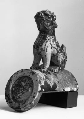 Roof Tile with Seated chimera, circular medallion on end