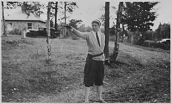 Eleanor Roosevelt shoots pistol at Chazy Lake, New York