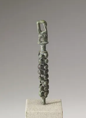 Ornament with Seated Figure