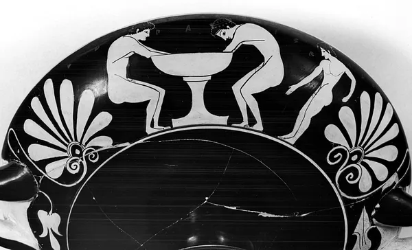 Kylix Depicting a Standing Youth and Two Youths Bathing