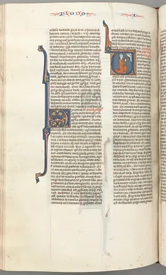 Fol. 354v, Amos, historiated initial V, Amos kneeling in prayer, bust of God above