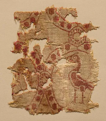 Fragment of roundels with single bird