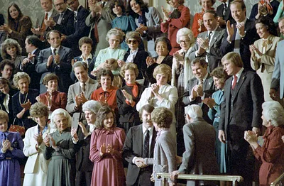 Nancy Reagan Shaking Hands with Lenny Skutnik during President Ronald Reagan's Address to the Joint Session of Congress on the State of the Union in the United States Capitol