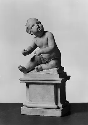 Seated Child on Pedestal