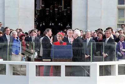 President Ronald Reagan being sworn in by Chief Justice Warren Burger on Inaugural Day at the United States Capitol