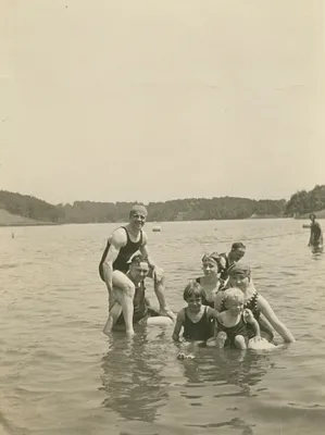 Bill and Verna Schnell with friends swimming in a lake during a holiday, 1924