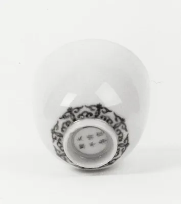 Blue and White Cup with Scroll Design