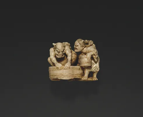 Netsuke with Demon Bathing