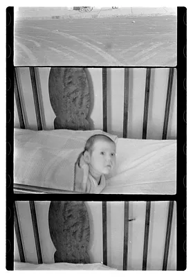 A baby in a crib