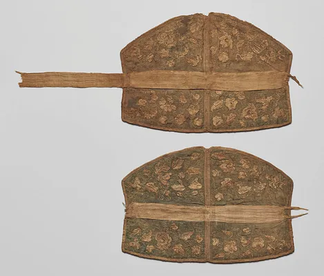 Pair of Headpieces