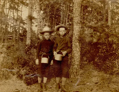 Two young boys "berrying" on Long Pond, South Yarmouth, Mass.