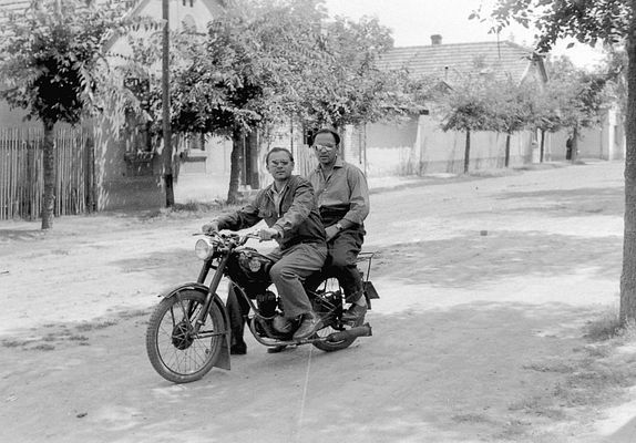 Men on a Csepel 125/T Motorcycle