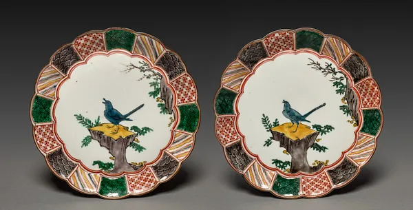 Pair of Dishes with Singing Bird on a Rock
