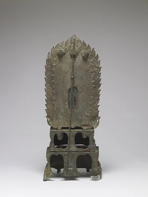 Standing Buddha on Throne
