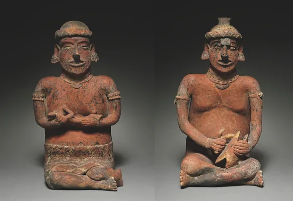 Pair of Seated Figures