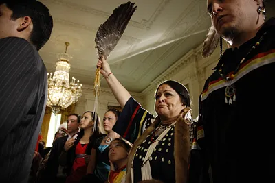Family Members of U.S. Army Master Sgt. Woodrow Wilson Keeble Stand as the Medal of Honor is Presented Posthumously by President George W. Bush