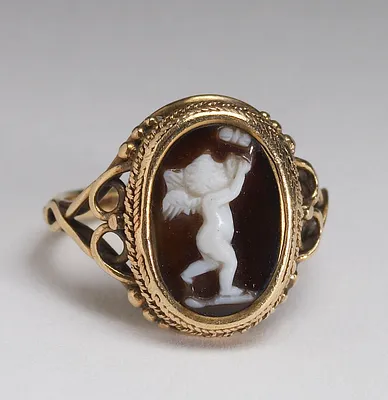Ring with Cupid Chasing a Butterfly