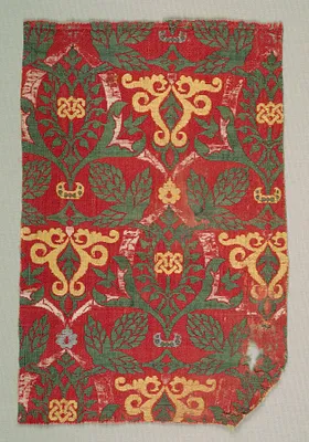 Fragment with curving vine and palmette leaves