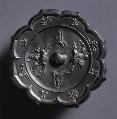Octafoil Mirror with Riding Immortals and Rising Peaks