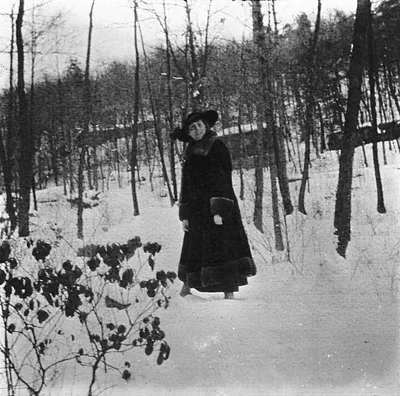 Photograph of Woman in Hat and Overcoat