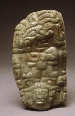 Pendant with an Official Wearing Earspools and a Headdress of Stylized Animals
