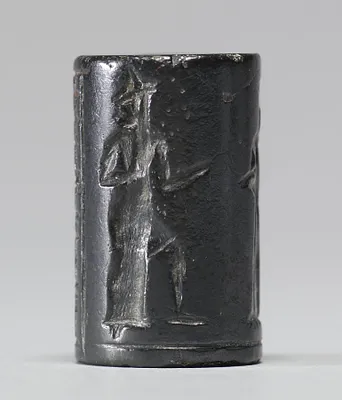 Cylinder Seal with a Presentation Scene and an Inscription