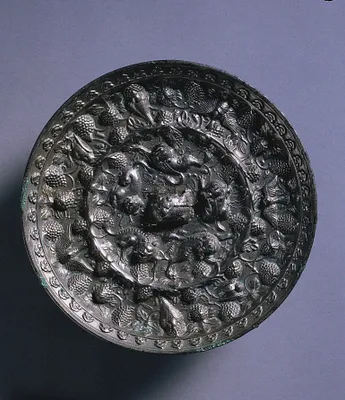 Animal-and-Grape Mirror with a Variety of Birds
