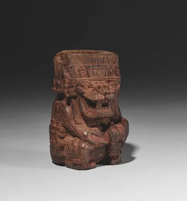 Container in the form of a Sacrificer