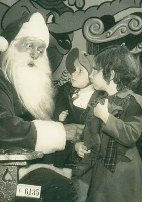 Becky & Audrey visiting Santa, Black’s Building, 1949