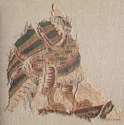 Tapestry with beheaded bird