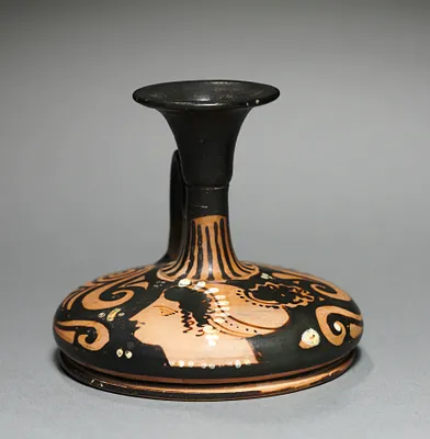 Red-Figure Squat Lekythos (Oil Vessel): Female Head