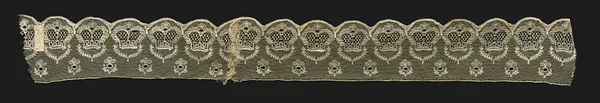 Lace with design known as "Crown Derby"
