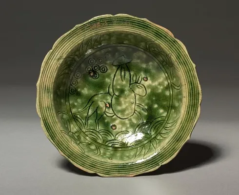Dish with Incised Design of a Rider on a Mule