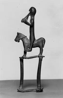 Man Riding a Horse