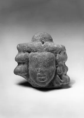 Head of a Village Divinity