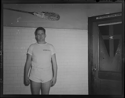 Man in pool locker room