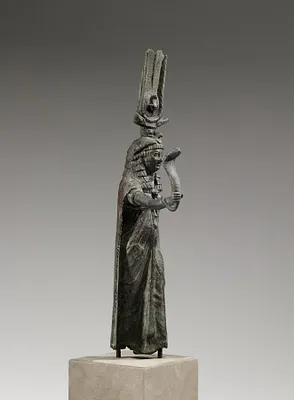 Isis Holding a Cobra
