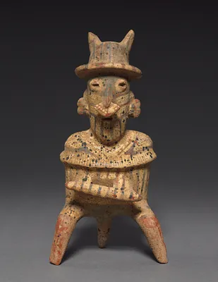 Seated Male Holding Chief’s Baton