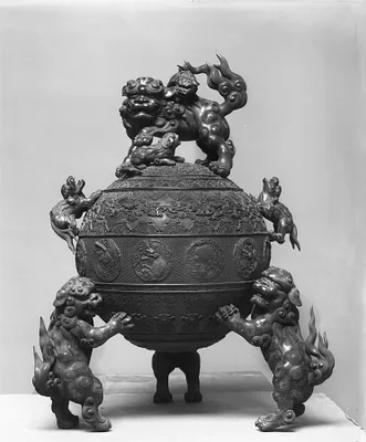 Covered globular container with twelve animals; scroll-leaf design, shishi supports
