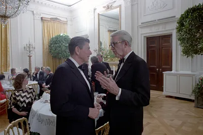 President Ronald Reagan with James Stewart at the President's 70th birthday party in the East Room