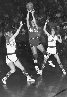 Mom, Angie Reynolds, shooting during basketball game, 1980