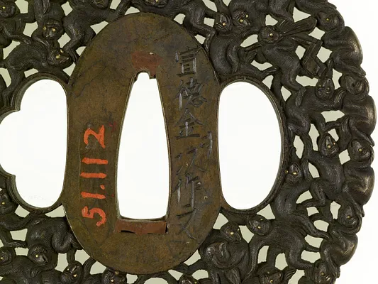 Tsuba with One Hundred Monkeys