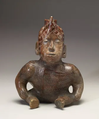 Seated Dwarf Shaman with Horn on Forehead and Hands on the Knees