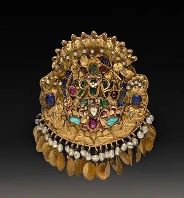 Pendant with Four-armed Green Vishnu on a lotus with Nagas