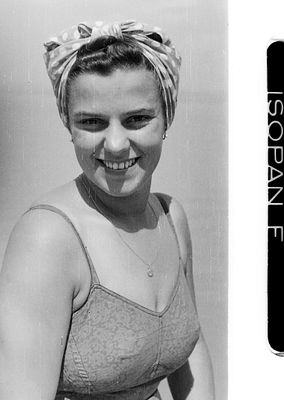 Smiling Young Woman in Headscarf